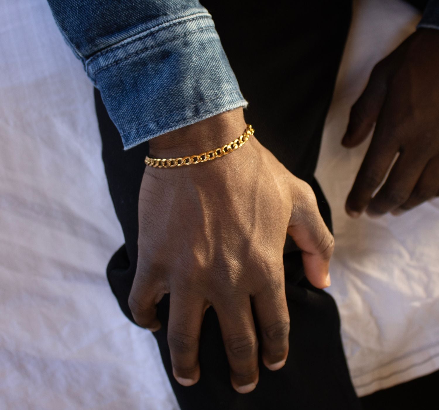 gold bracelet on wrist