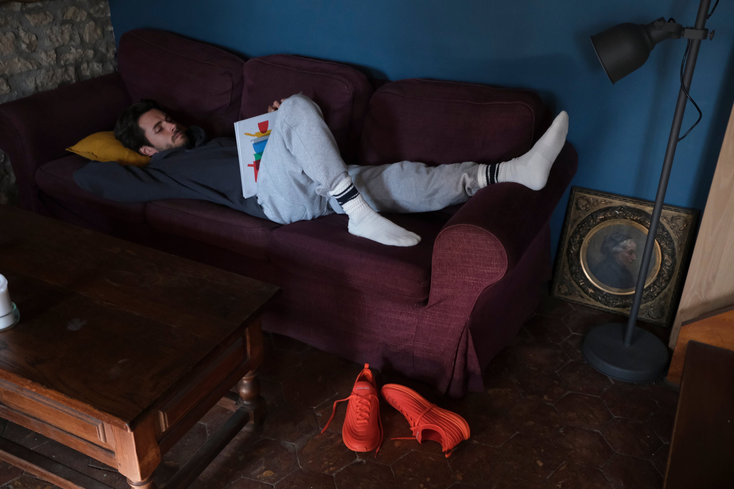 men's casual shoes - man resting on couch