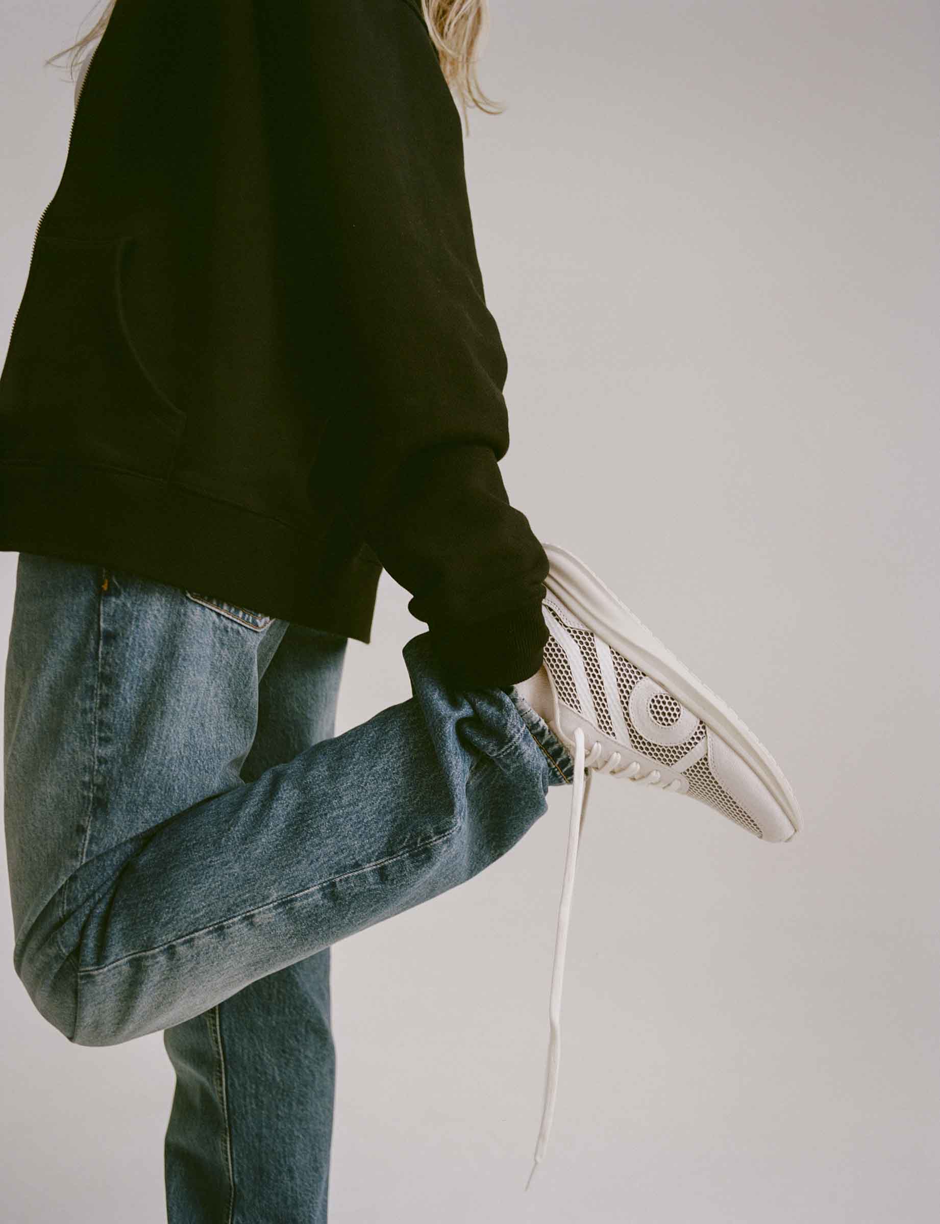 woman wearing shoes designed for high arch support
